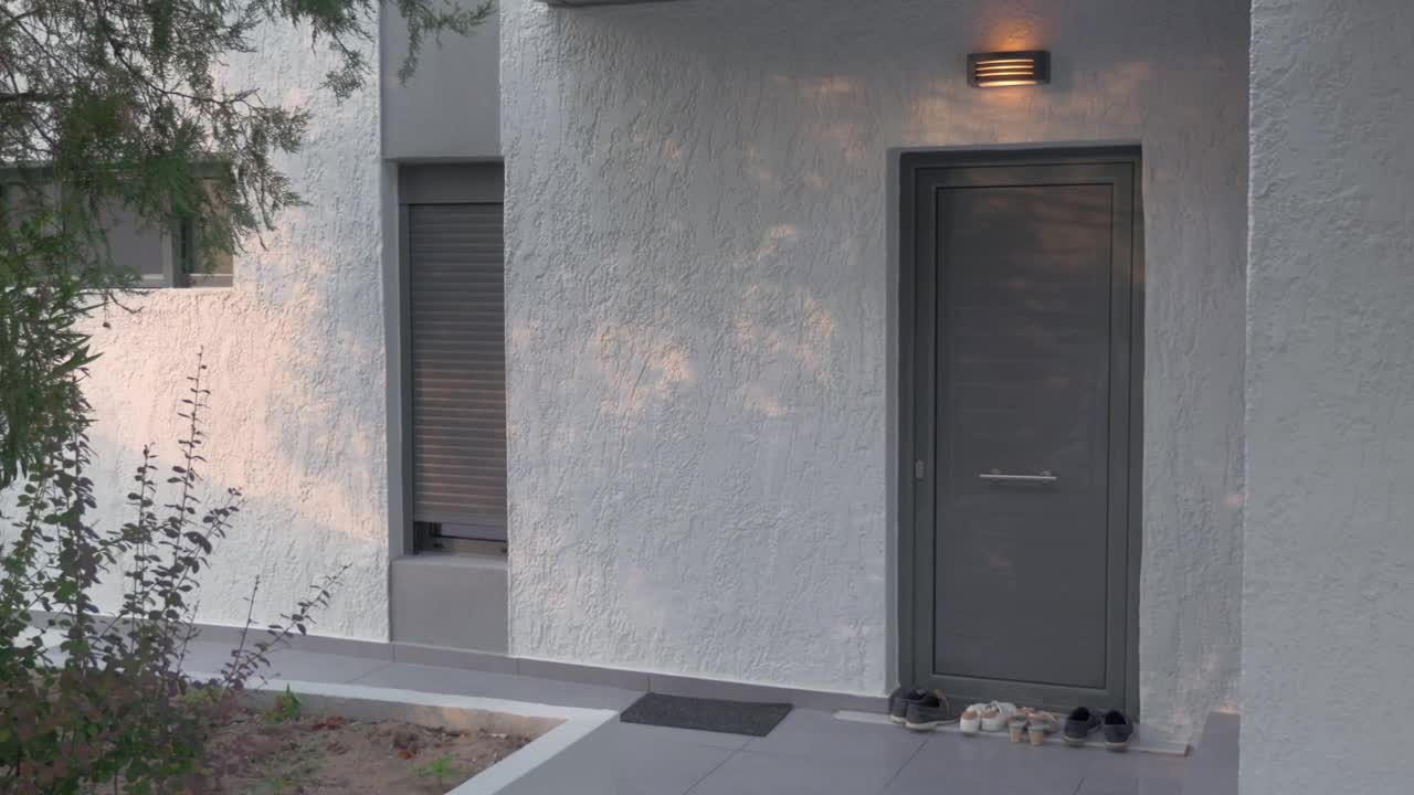 Stock Footage Woman Leaving Her House Live Wallpaper Free