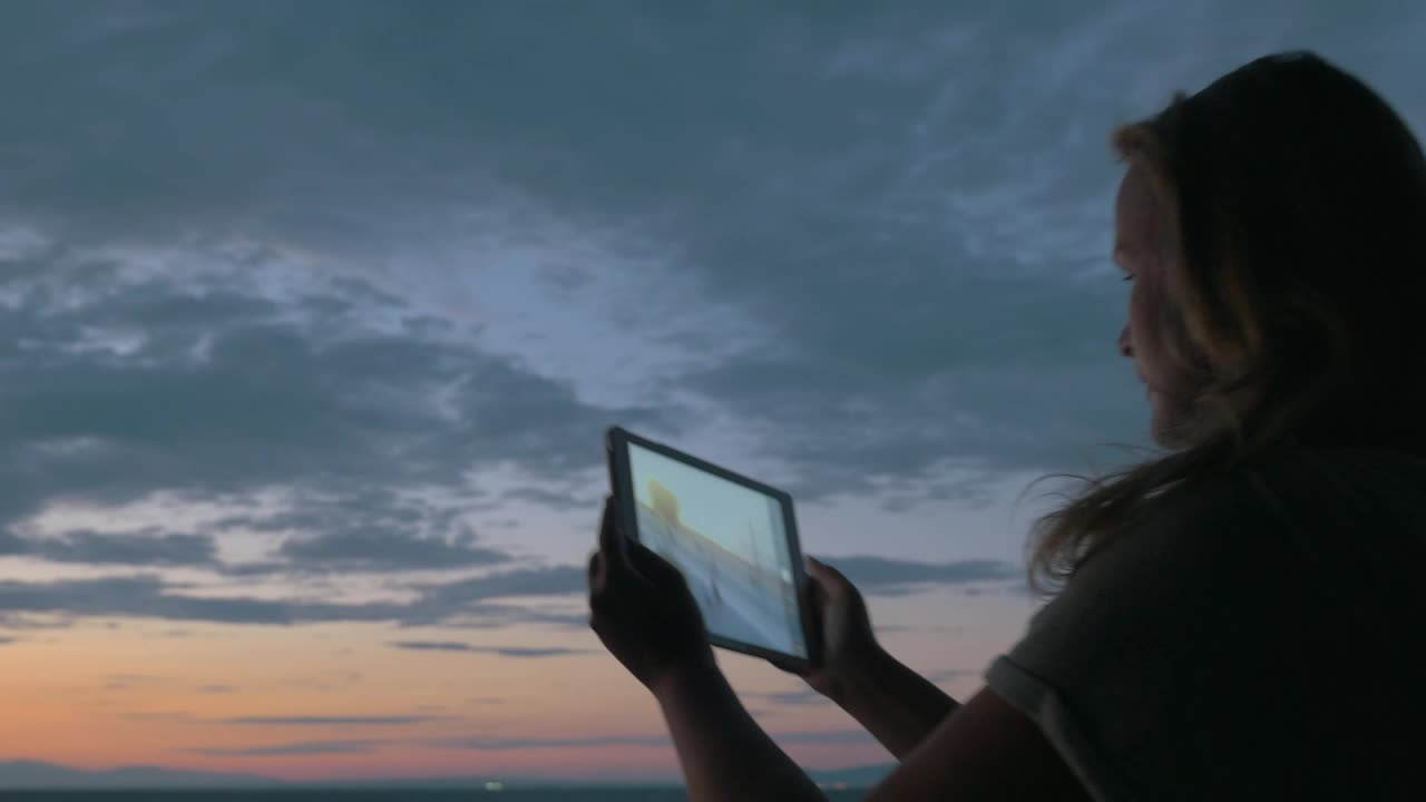Stock Footage Woman Taking Photos At Dusk Live Wallpaper Free