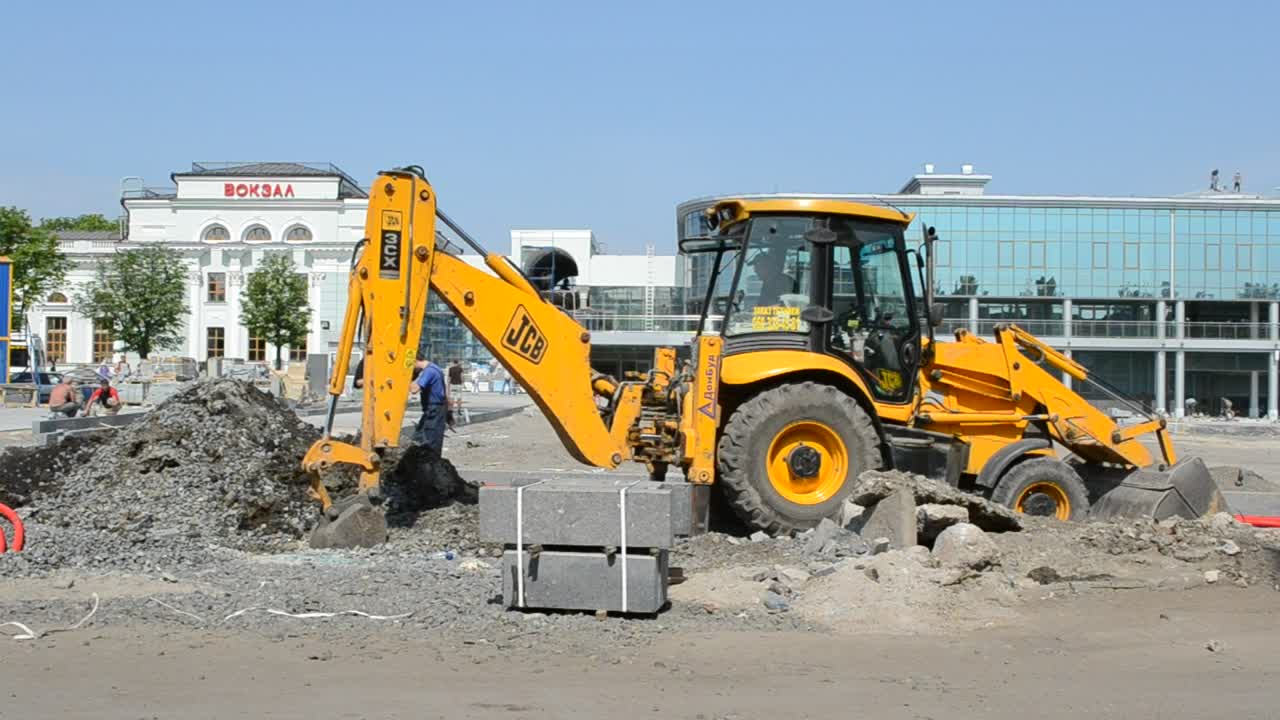 Stock Footage Workers Digging Up The Road Live Wallpaper Free