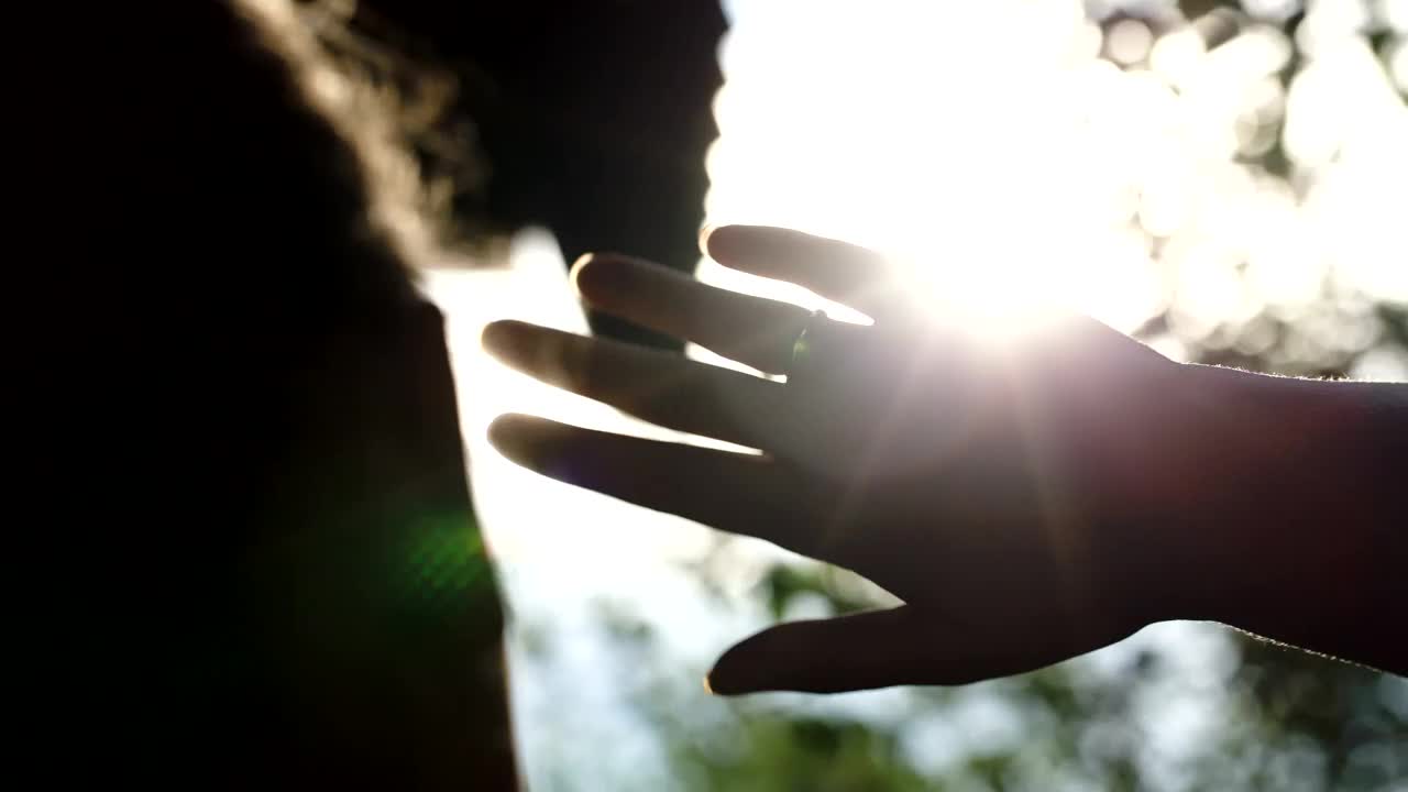 Stock Footage Woman Holding Up Her Hand To Block The Sun Live Wallpaper Free