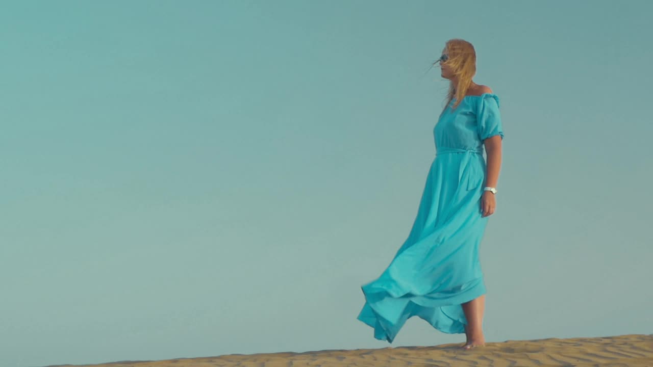 Stock Footage Woman Standing Still In A Blue Dress Live Wallpaper Free