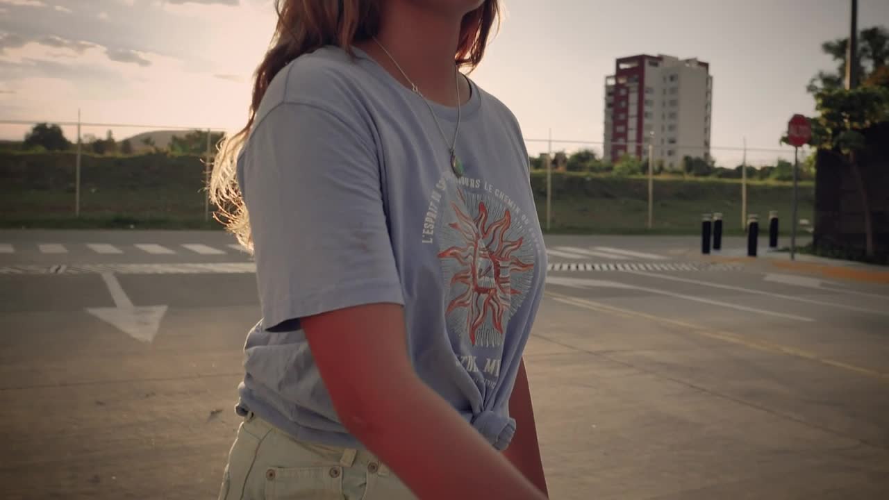 Stock Footage Young Girl Skating Under The Sunset On An Empty Street Live Wallpaper Free