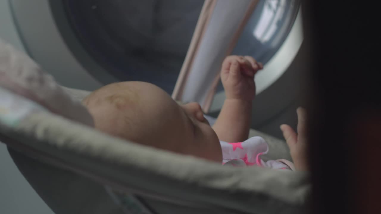 Stock Footage Young Baby In A Seat Live Wallpaper Free