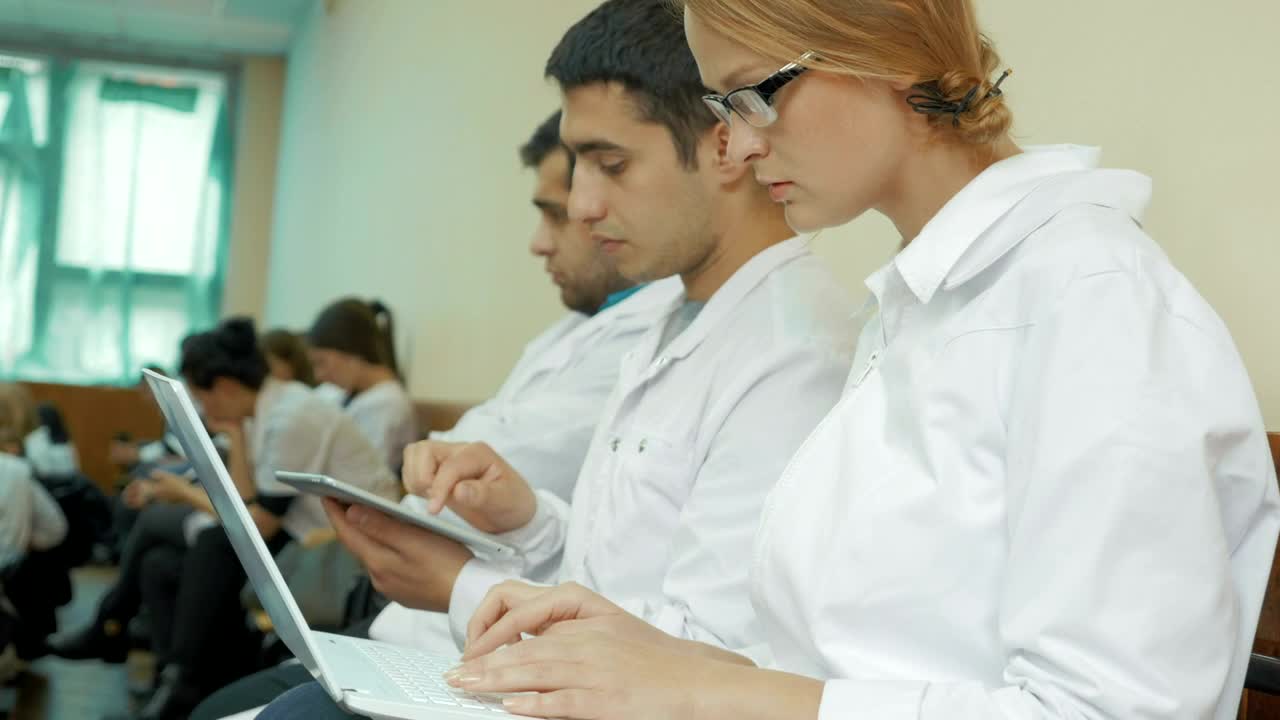 Stock Footage Young Doctors At A Conference Live Wallpaper Free