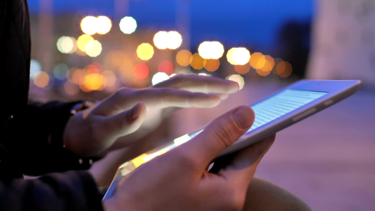 Stock Footage Woman Using A Tablet On The Street Live Wallpaper Free