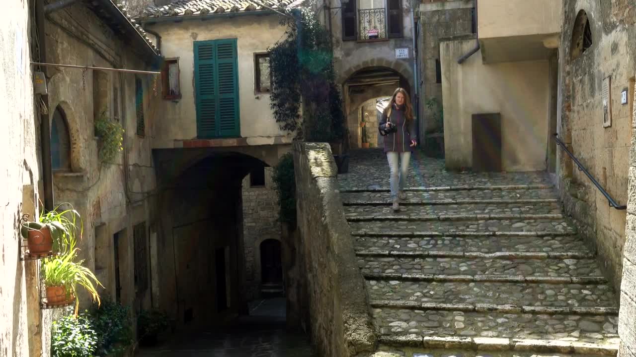 Stock Footage Woman Walking Down The Stairs Of An Ancient City Live Wallpaper Free