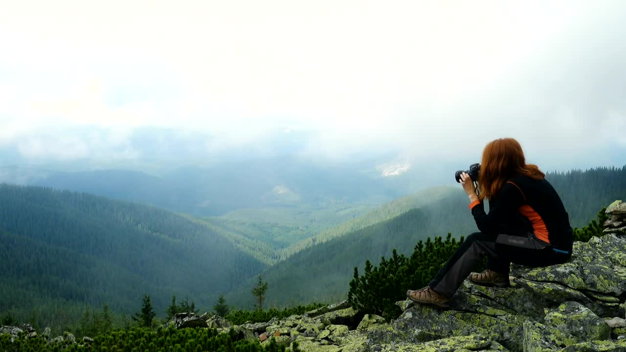 Stock Footage Woman Taking Photos In The Top Of The Mountain Live Wallpaper Free
