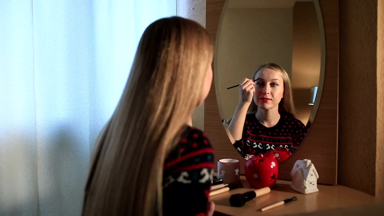 Stock Footage Woman Doing Her Makeup In The Mirror Live Wallpaper Free