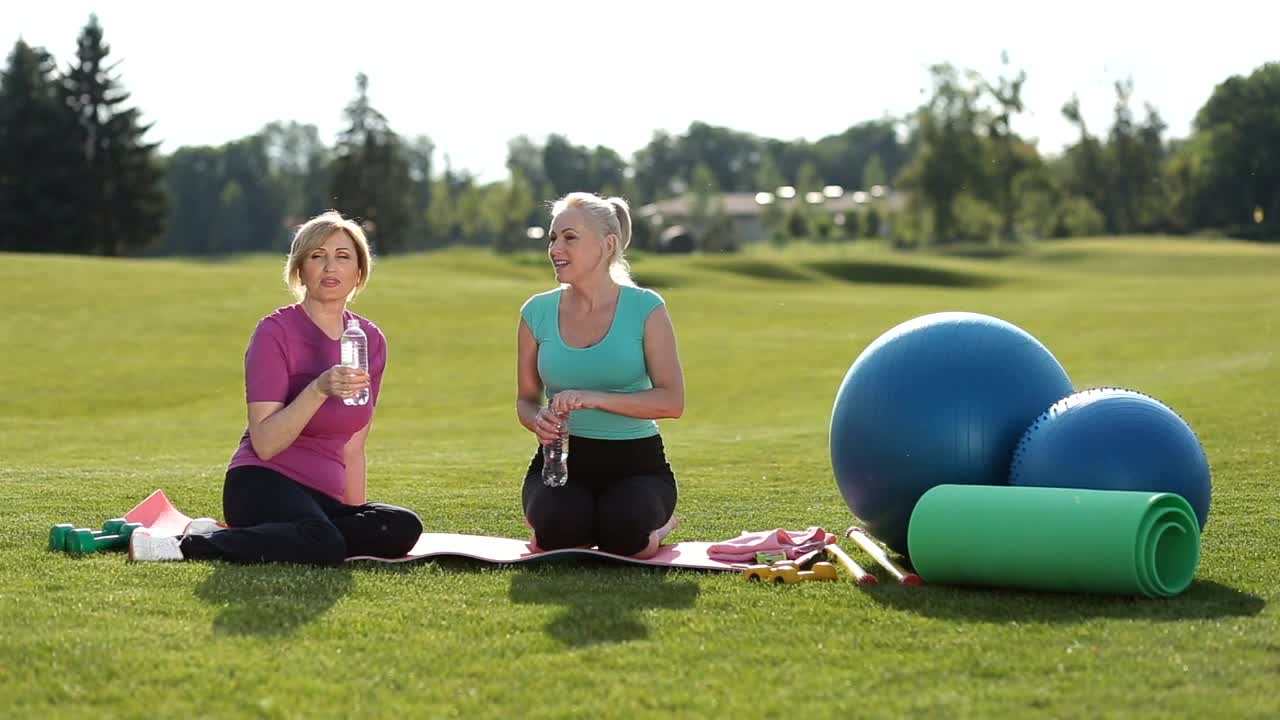 Stock Footage Women Taking A Break From Yoga Live Wallpaper Free