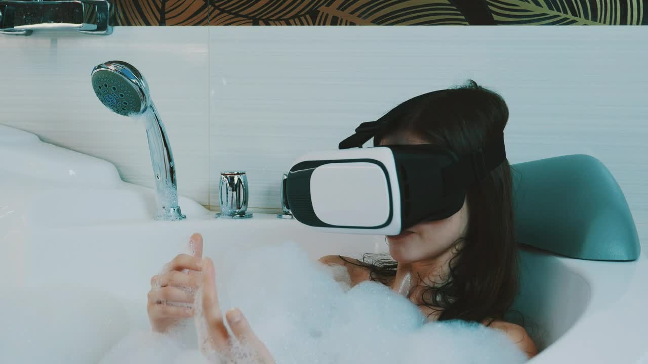 Stock Footage Woman Taking A Bath With A Vr Headset Live Wallpaper Free