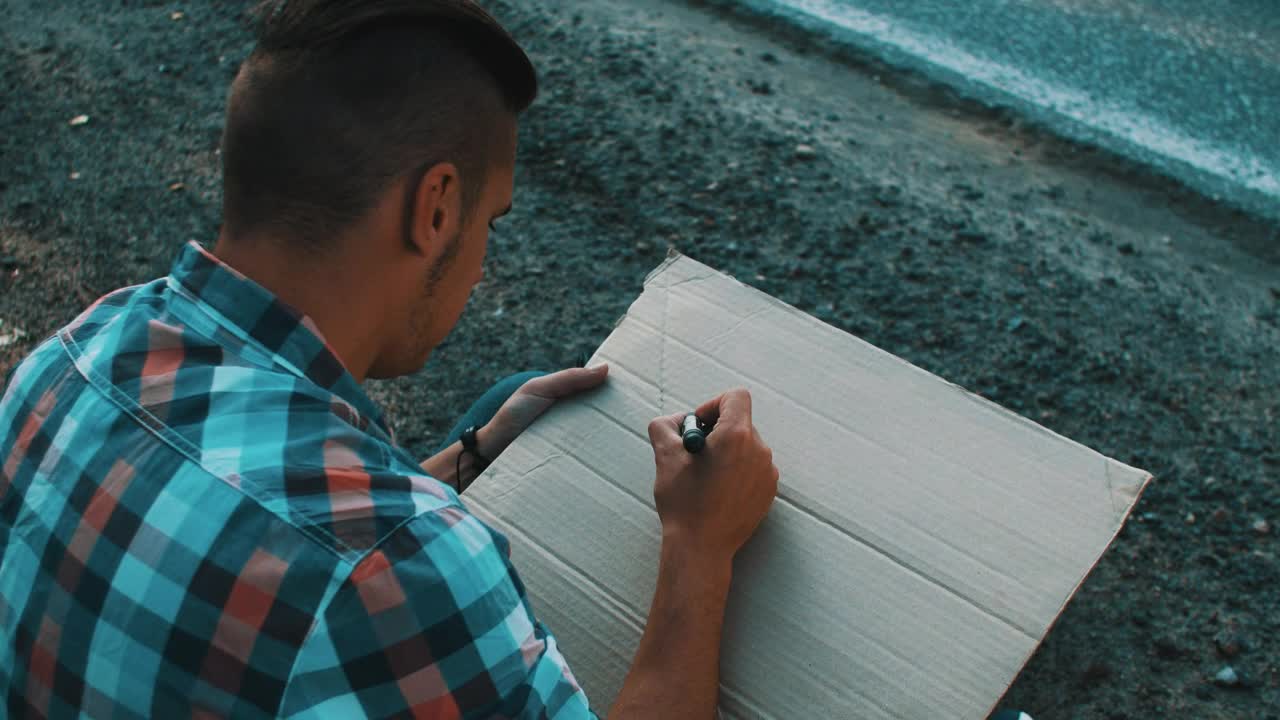 Stock Footage Writing On A Cardboard Sign Live Wallpaper Free