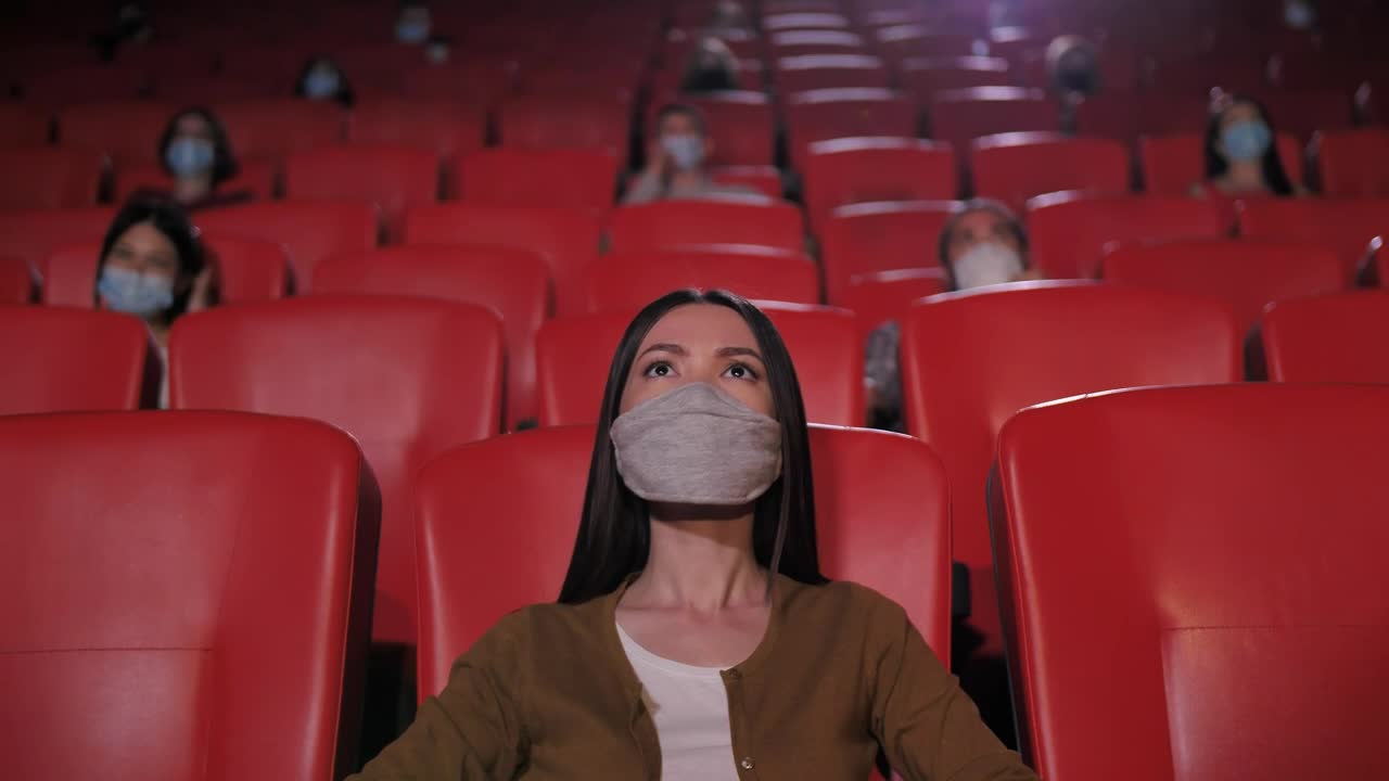 Stock Footage Woman Wearing A Mask At The Cinema Live Wallpaper Free