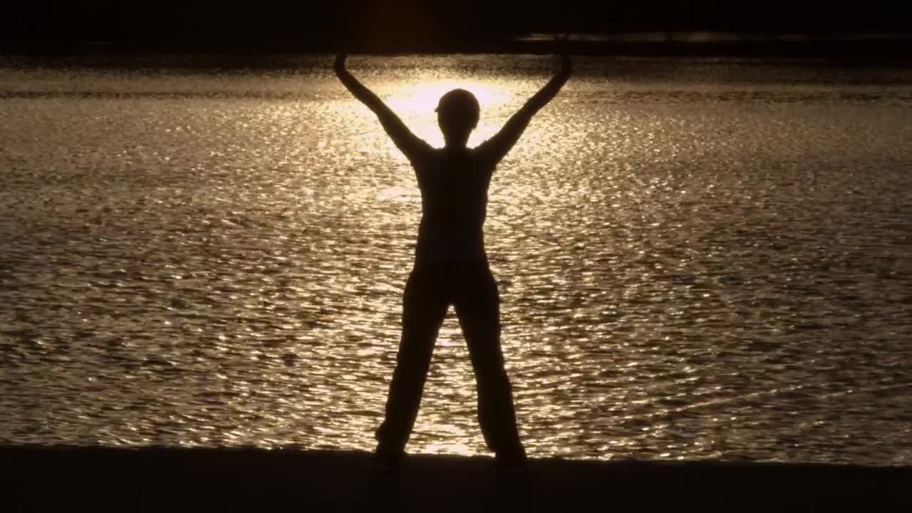 Stock Footage Woman Stretching In The Morning By A River Live Wallpaper Free