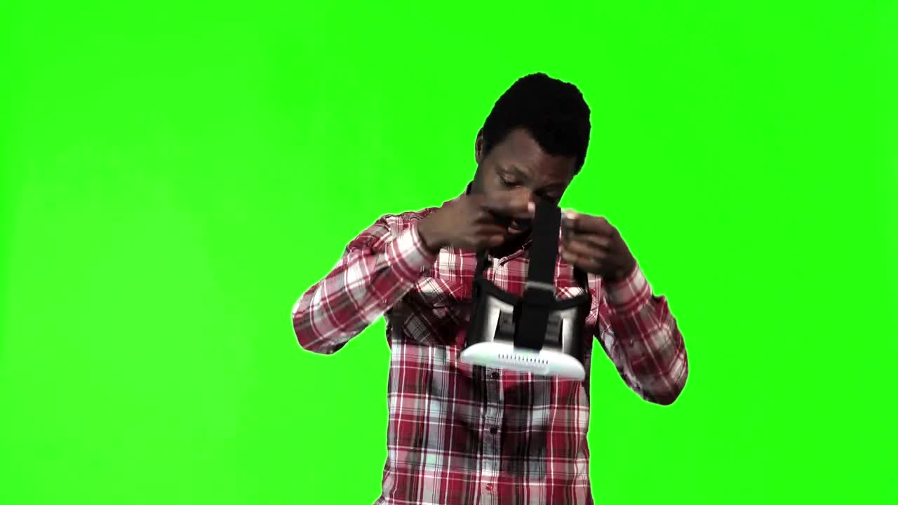 Stock Footage Young Man Putting On Virtual Reality Glasses Live Wallpaper Free