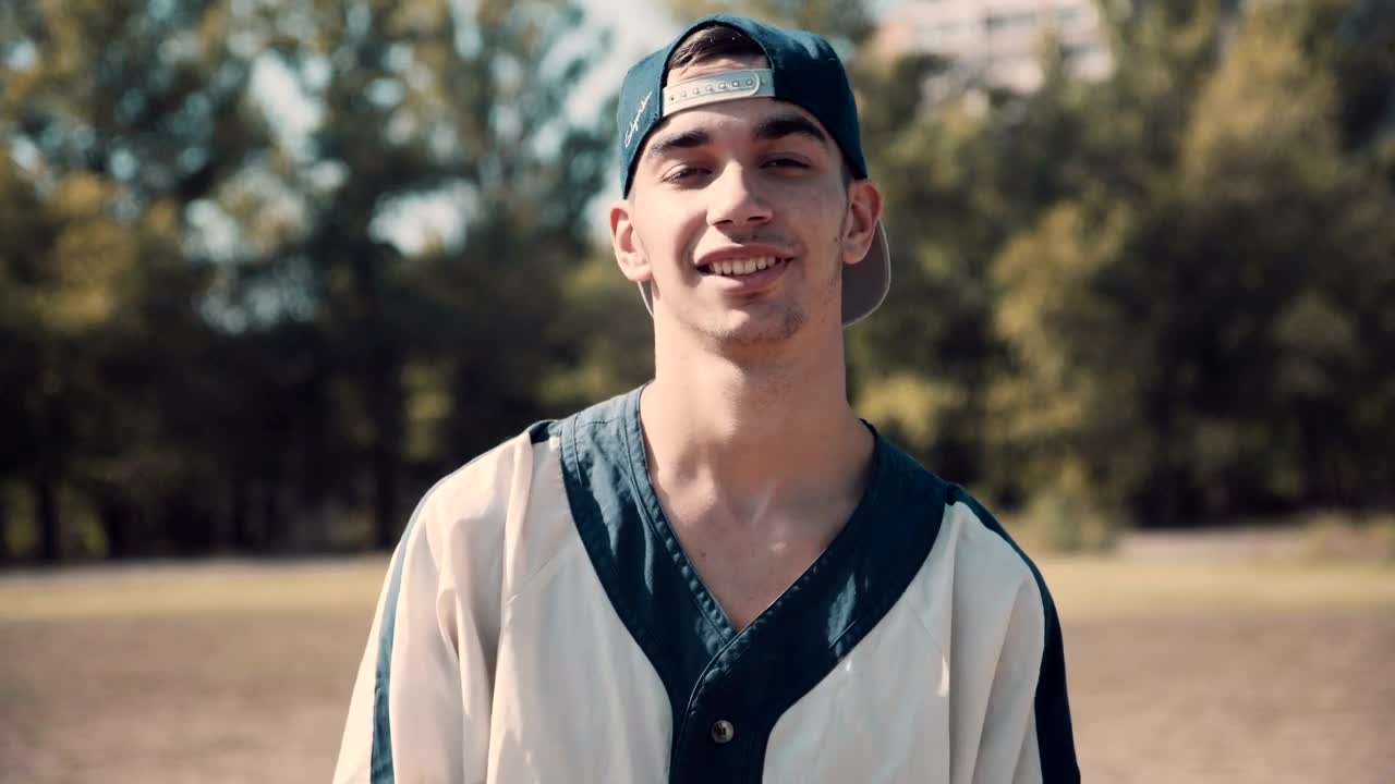 Stock Footage Young Man With Baseball Bat In The Park Live Wallpaper Free