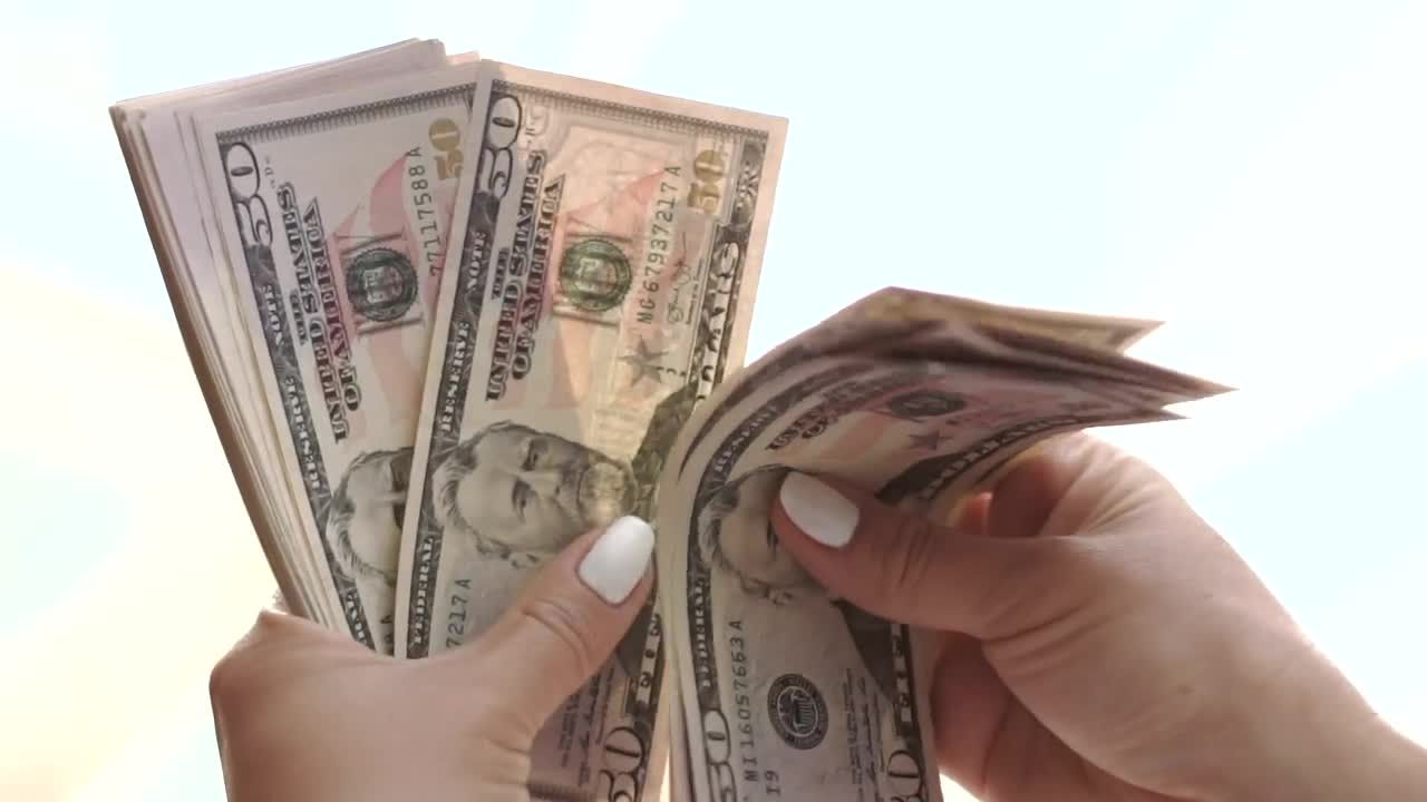 Stock Footage Woman Counting Dollars Live Wallpaper Free
