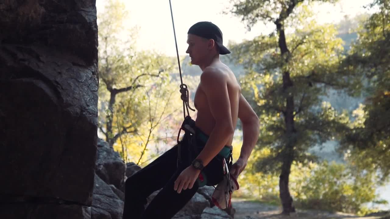 Stock Footage Young Shirtless Climber Starts To Climb Live Wallpaper Free