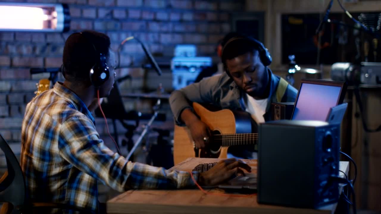Stock Footage Young Musicians Playing In A Home Studio Live Wallpaper Free