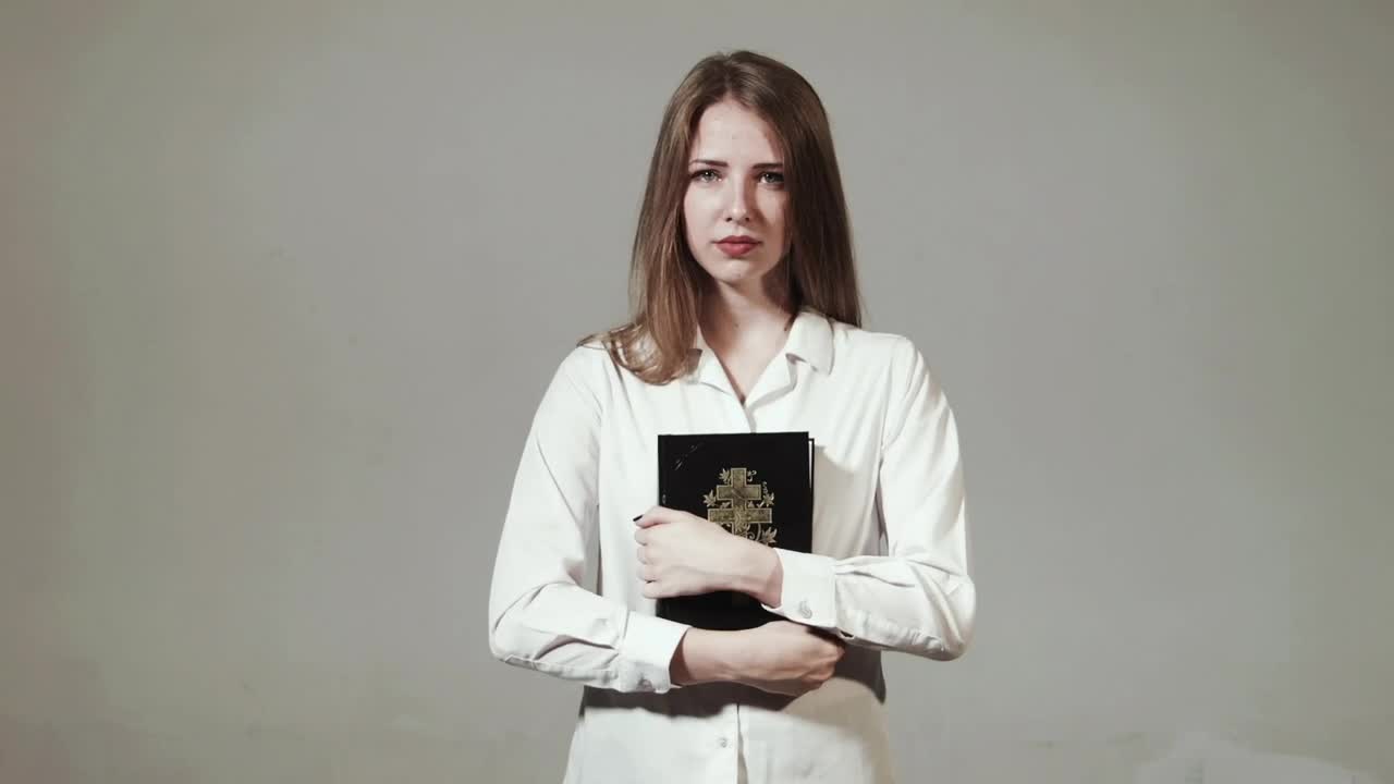 Stock Footage Young Woman Reading The Bible Live Wallpaper Free