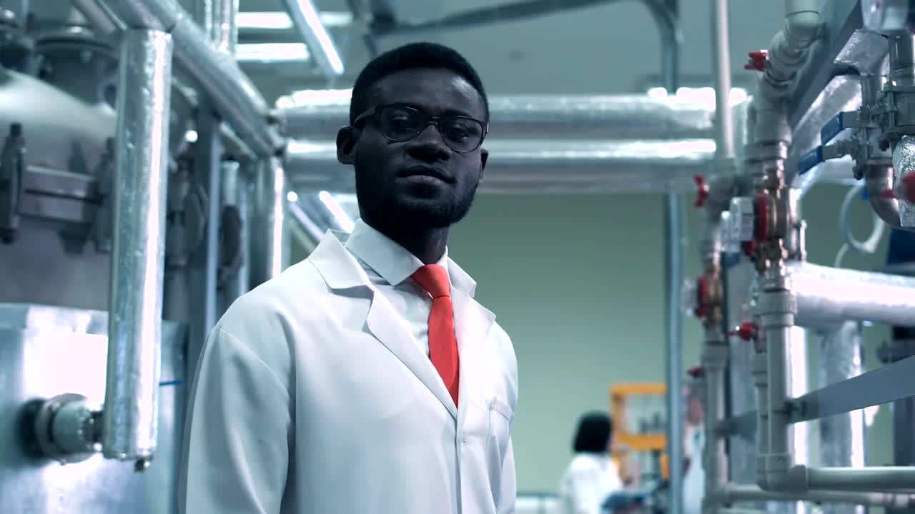 Stock Footage Young Scientist Looking At Camera Live Wallpaper Free