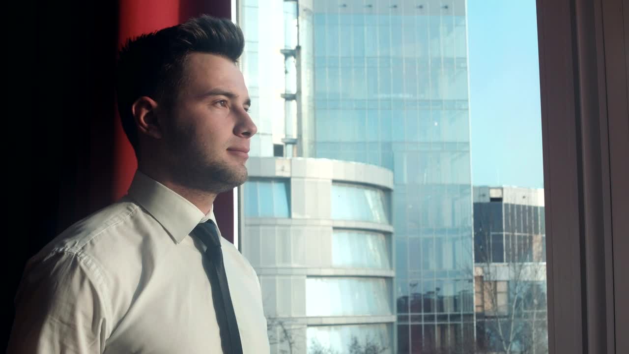 Stock Footage Young Businessman Portrait Near The Window Live Wallpaper Free