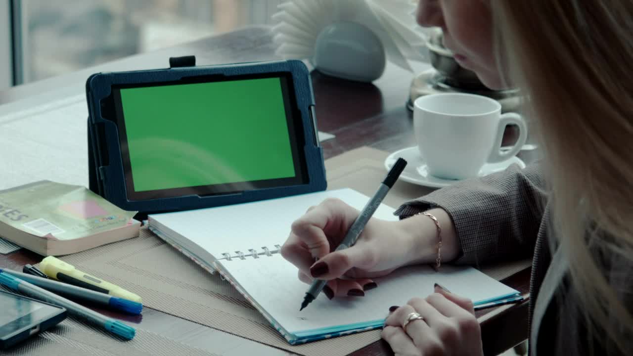 Stock Footage Writing A Note On A Notebook And Using Tablet Live Wallpaper Free
