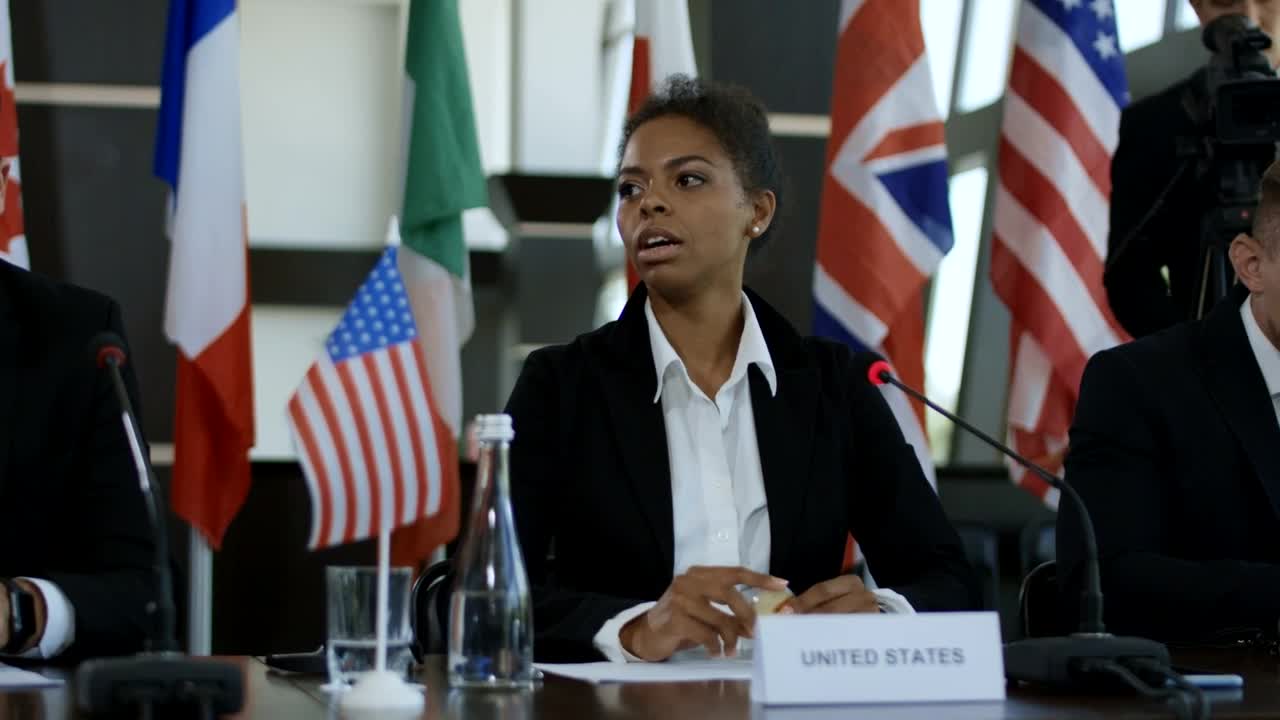 Stock Footage Woman Holding A Bitcoin Coin In A Conference Live Wallpaper Free
