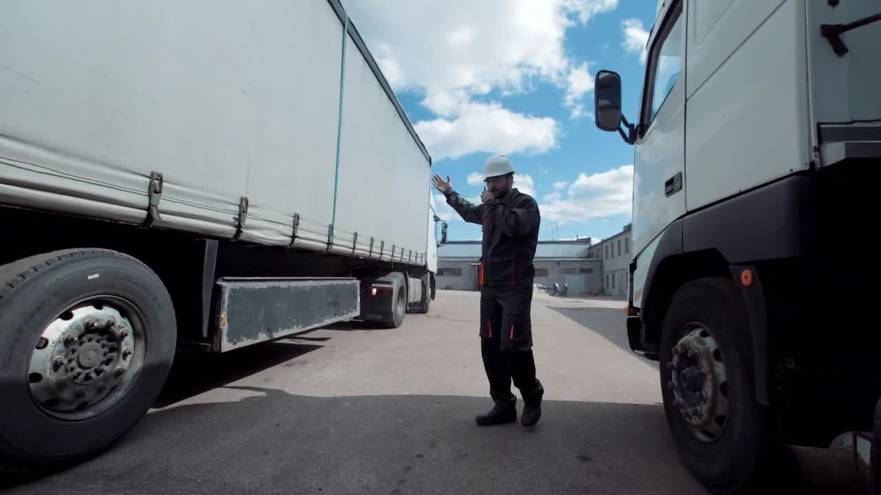 Stock Footage Working Giving Directions To Freight Truck Live Wallpaper Free