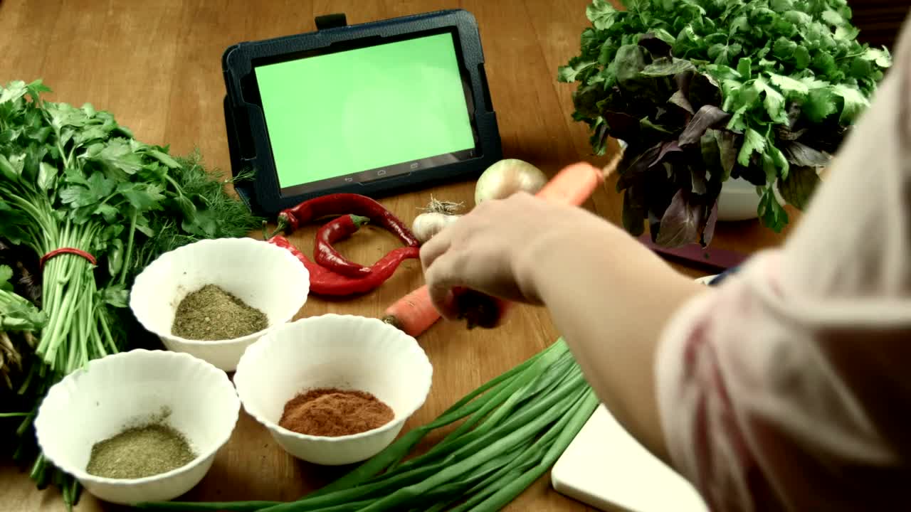 Stock Footage Women Watching A Recipe On A Tablet Device Live Wallpaper Free