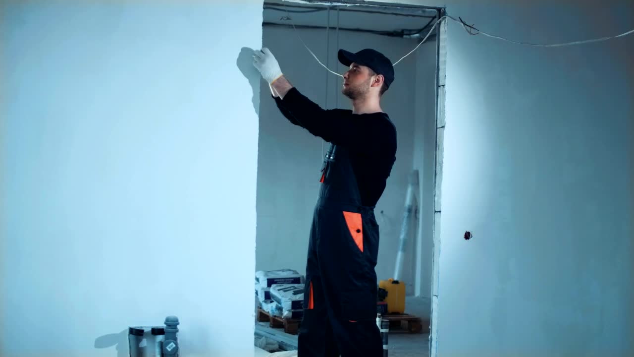 Stock Footage Young Man Taking Measurements On Construction Site Live Wallpaper Free