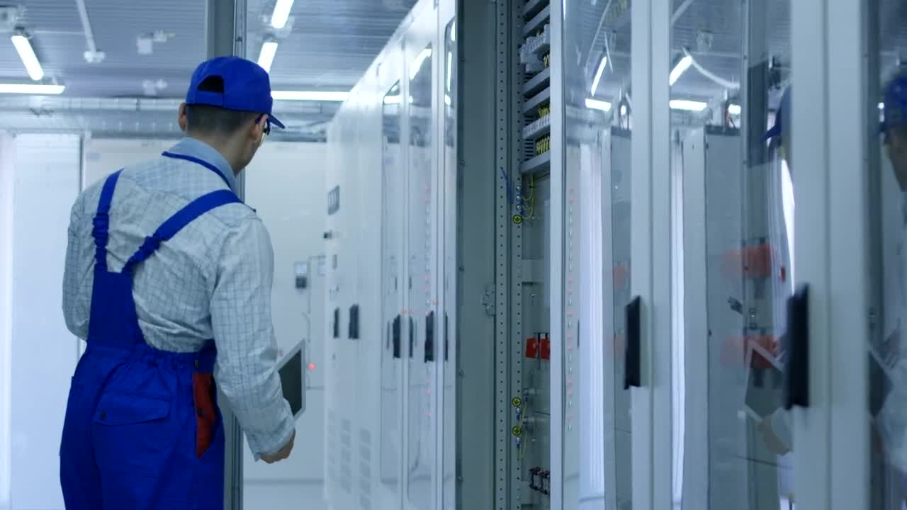 Stock Footage Worker Closing The Door In A Factory Live Wallpaper Free