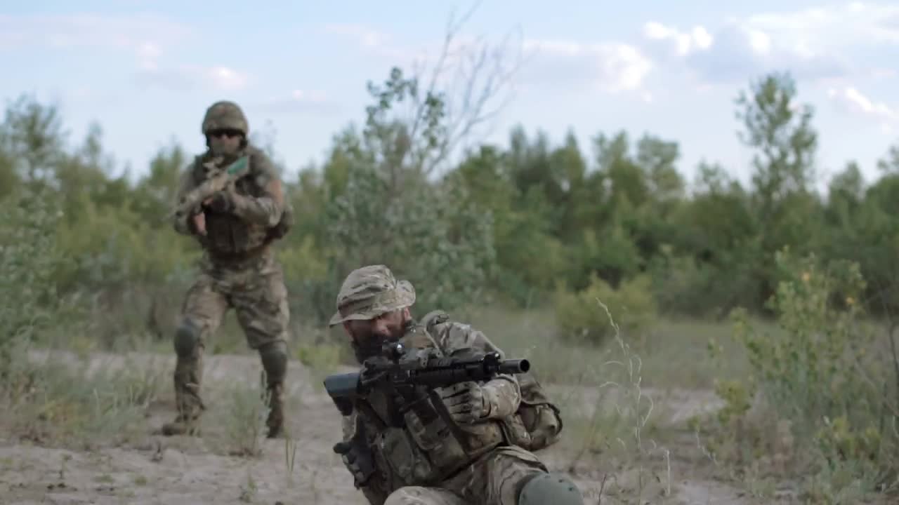 Stock Footage Wounded Soldier Rescued By A Battle Partner Live Wallpaper Free