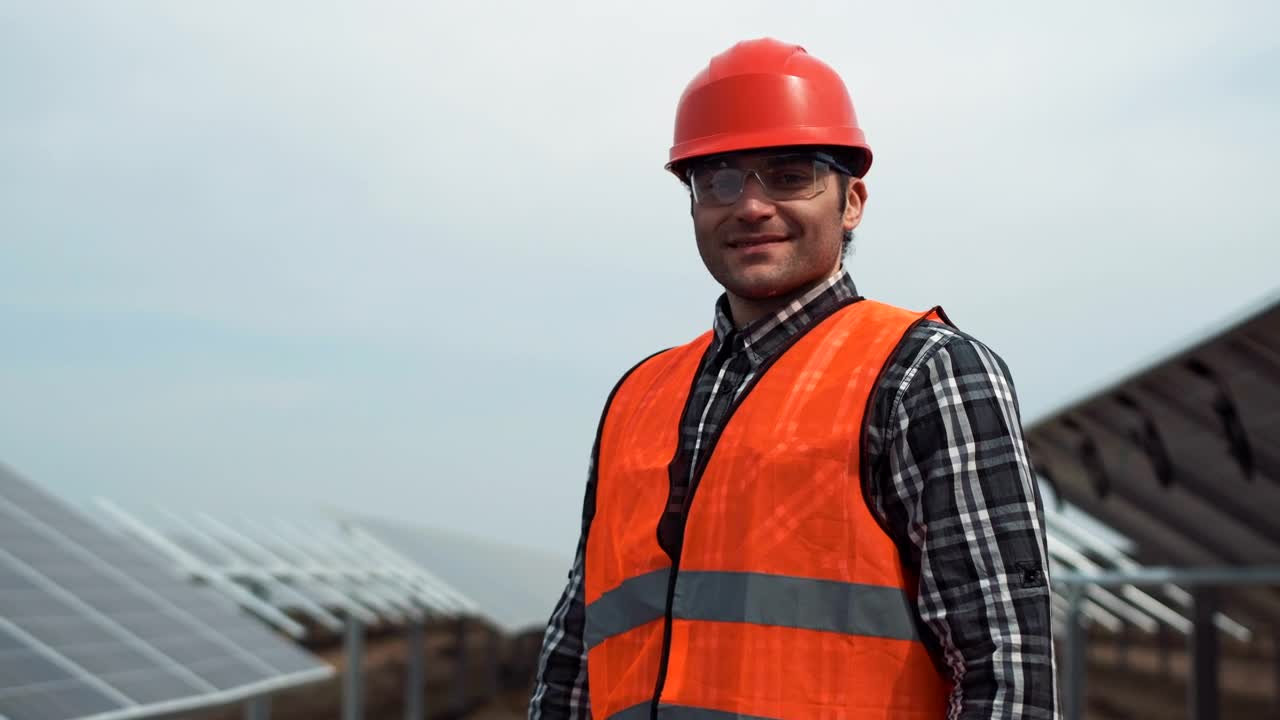 Stock Footage Worker Posing In A Solar Panel Field Live Wallpaper Free