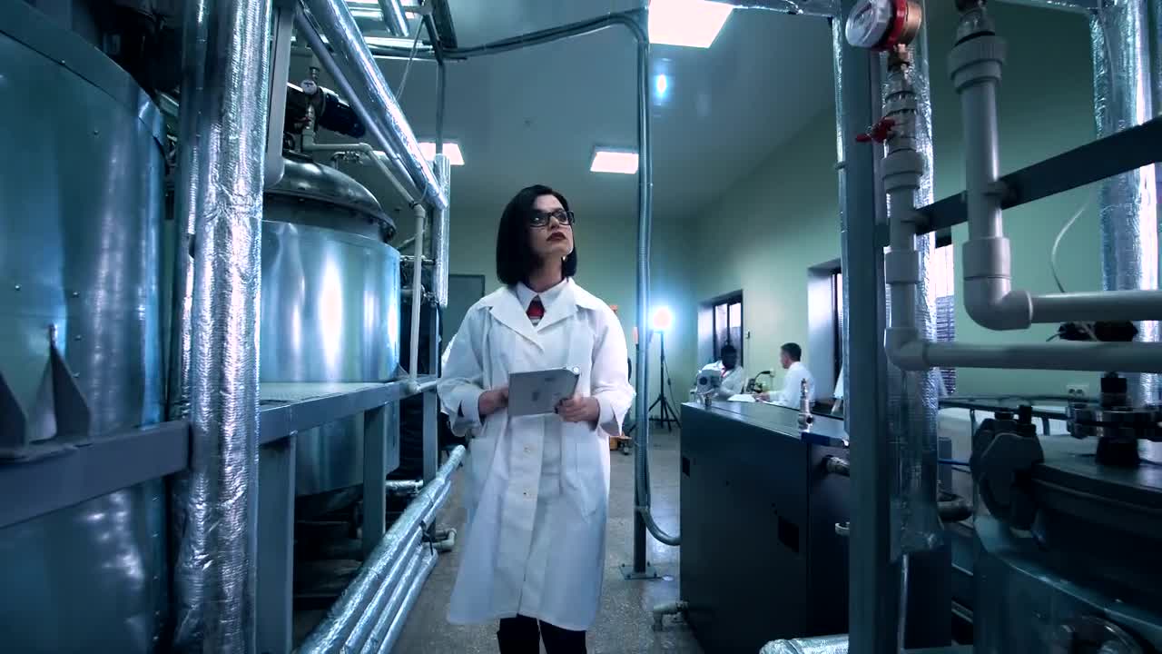 Stock Footage Woman With A Tablet In The Laboratory Live Wallpaper Free