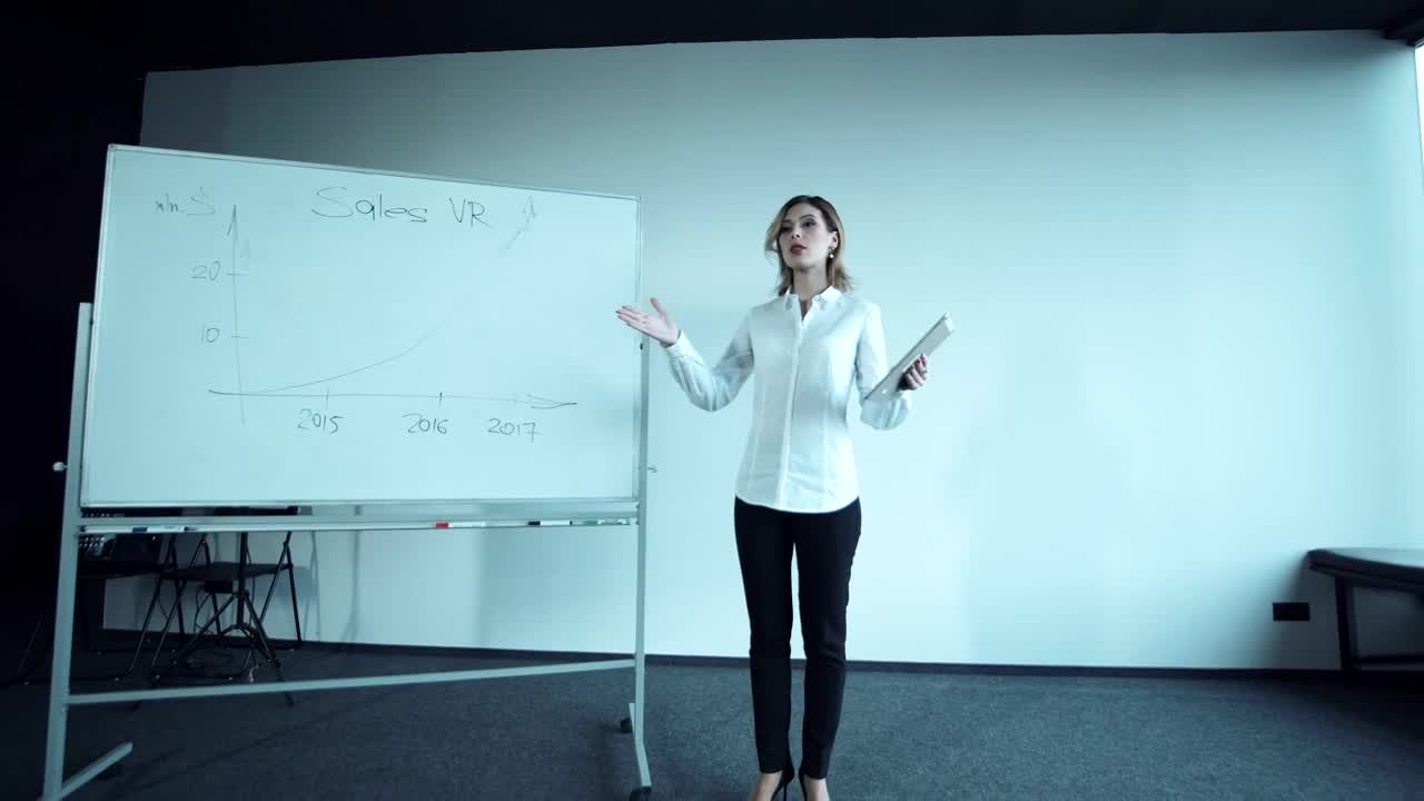 Stock Footage Woman Giving A Talk In Front Of An Audience Live Wallpaper Free