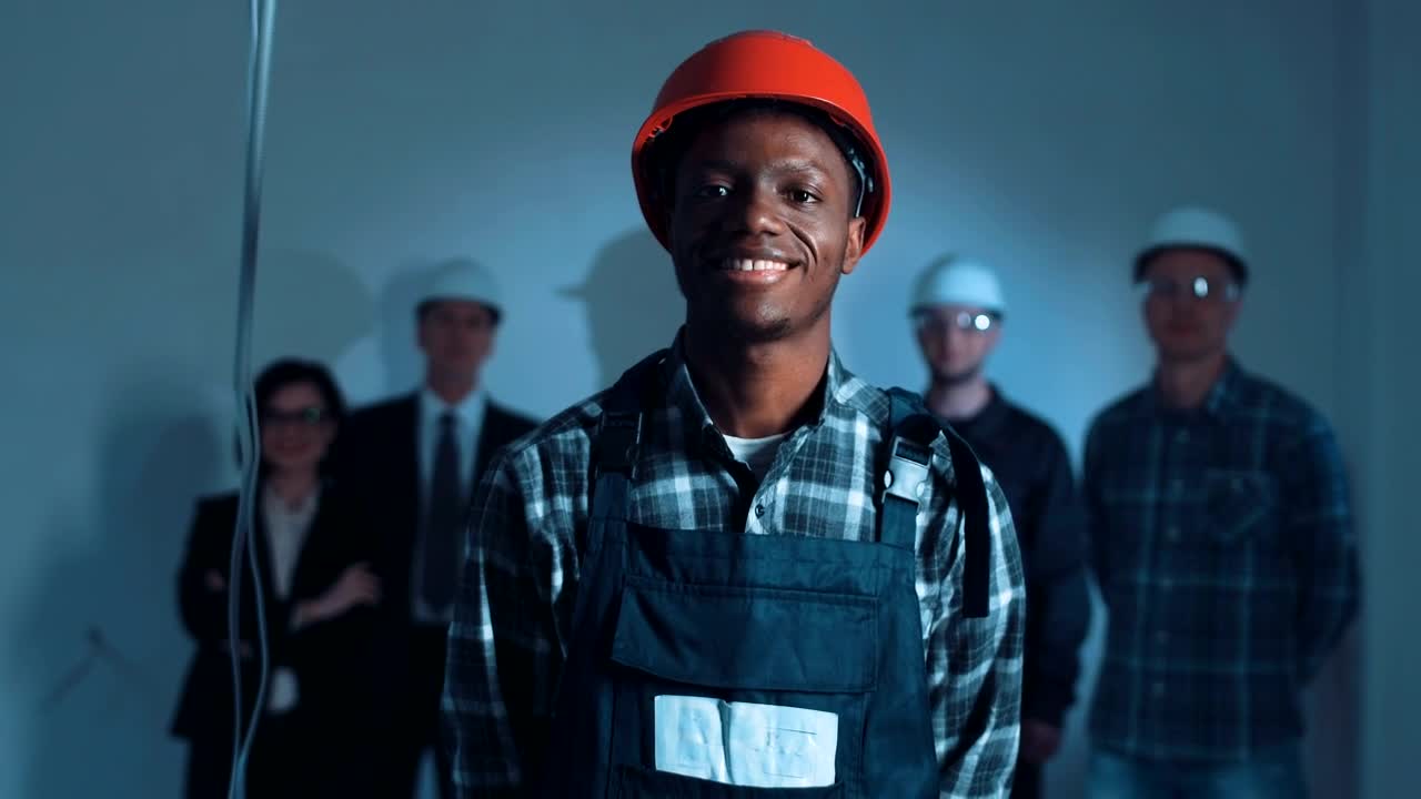 Stock Footage Young Construction Worker Posing With Helmet Live Wallpaper Free