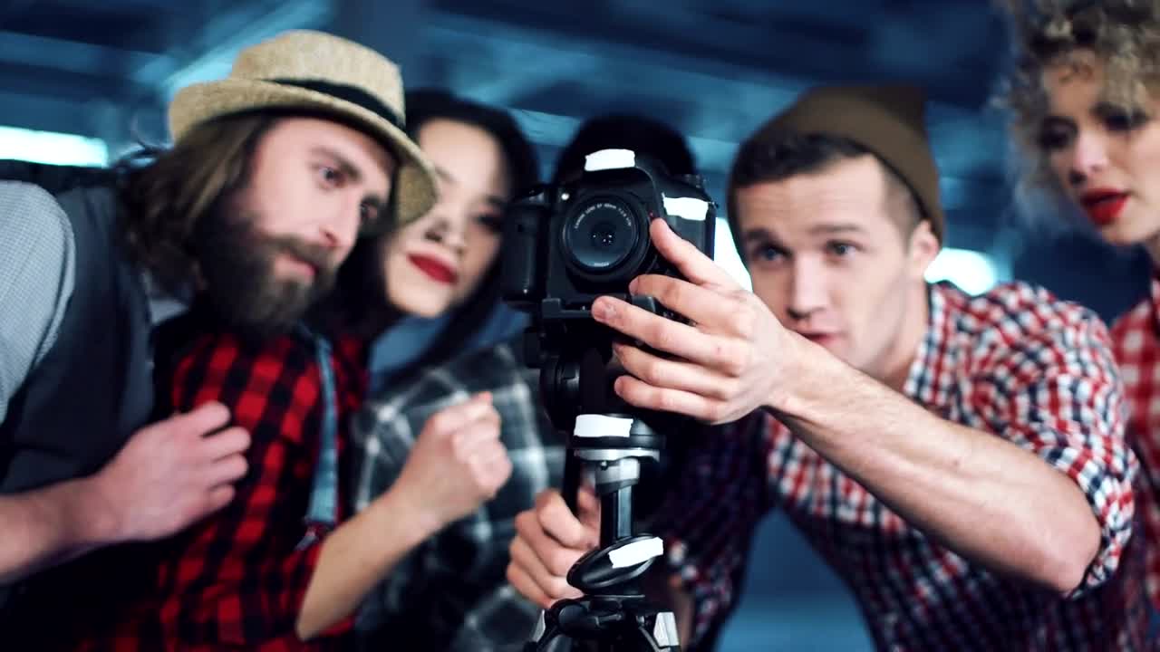 Stock Footage Young People Watching Display Camera Live Wallpaper Free