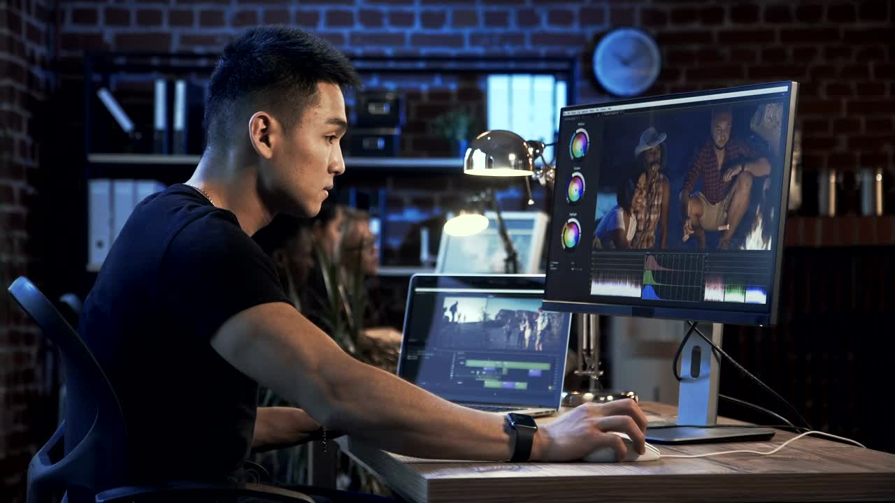 Stock Footage Young Man Using Video Editing Software Live Wallpaper Free