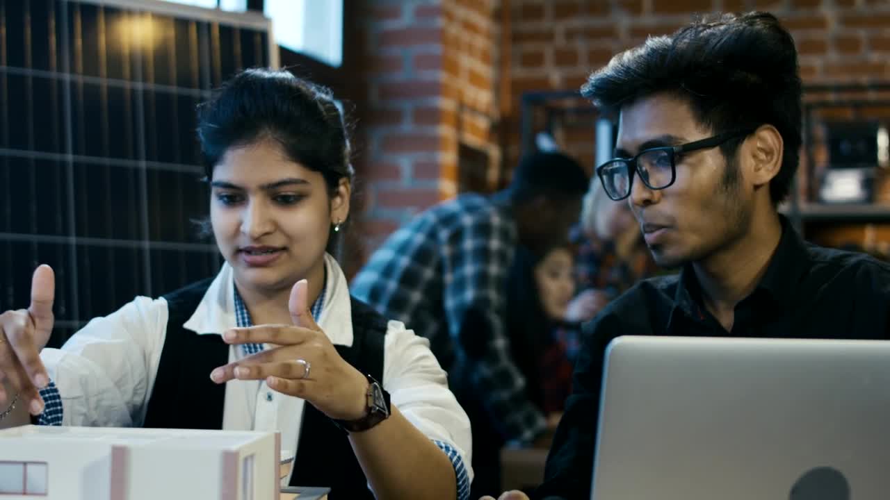 Stock Footage Young Architects Checking A House Model Live Wallpaper Free