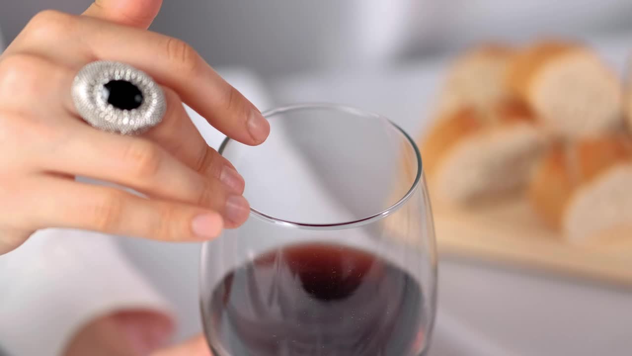 Stock Footage Woman Sliding Her Finger Along The Edge Of A Glass Live Wallpaper Free