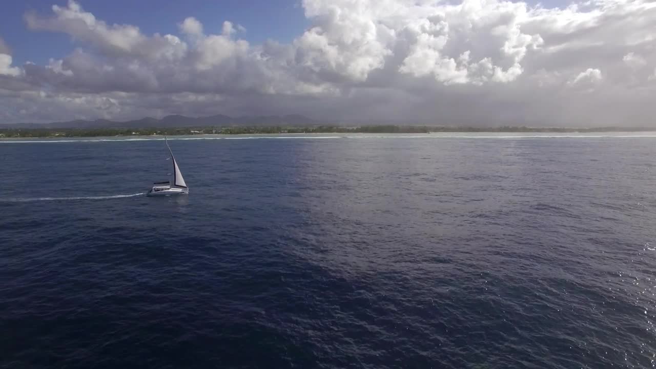 Stock Footage Yacht Sailing Past An Island Live Wallpaper Free