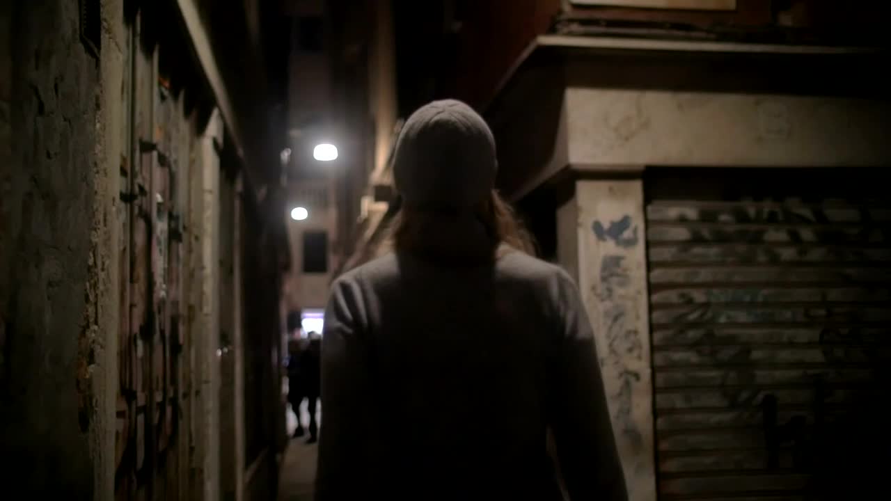 Stock Footage Woman Walking Down An Old Street Live Wallpaper Free