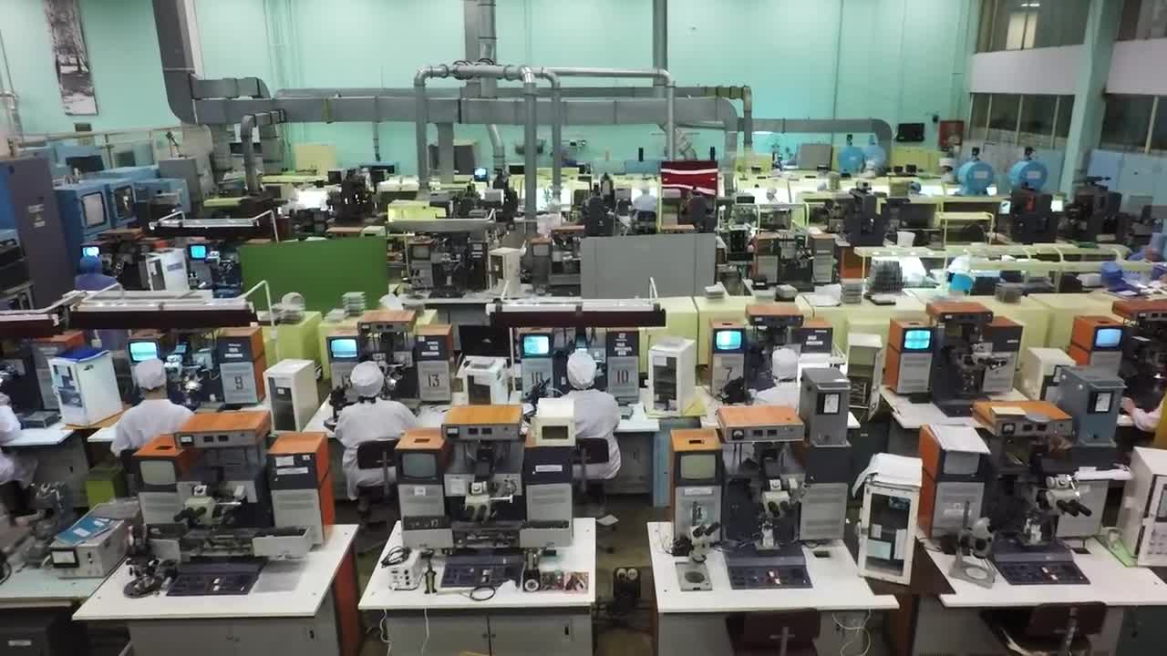 Stock Footage Working In A Electronics Factory Live Wallpaper Free