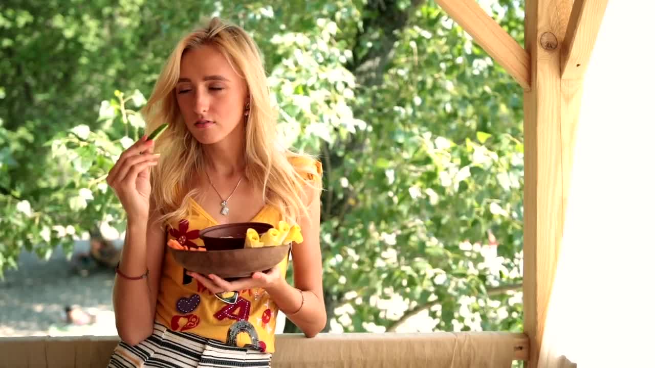 Stock Footage Woman Eating Vegetables Live Wallpaper Free