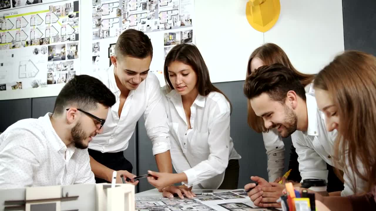 Stock Footage Work Group Planning An Architectural Project Live Wallpaper Free