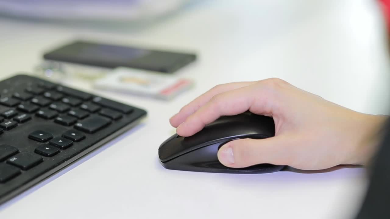Stock Footage Woman Using A Wireless Mouse Live Wallpaper Free