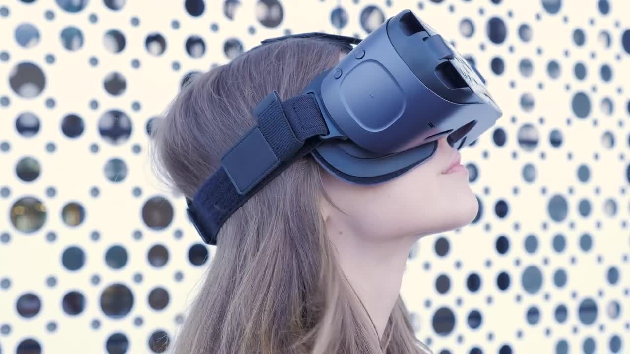 Stock Footage Woman Using A Vr Headset In A Bright Room Live Wallpaper Free