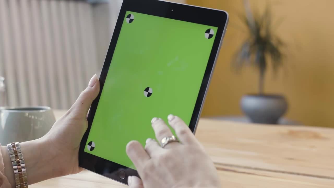 Stock Footage Woman Scrolling Down On A Tablet Live Wallpaper Free