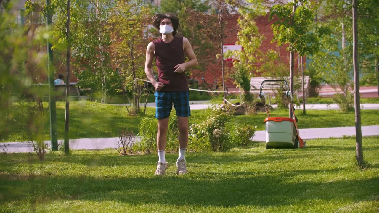 Stock Footage Young Man Starts To Run In The Park Live Wallpaper Free