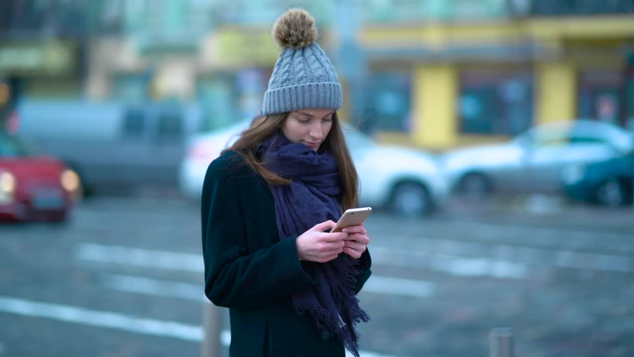 Stock Footage Young Woman On The Street Texting On Her Phone Live Wallpaper Free